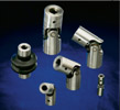 Curtis Alloy Steel Joints feature 41L40-grade steel for all forks. Forks of 7/8 inch diameter and larger have induction-hardened bearing areas for strength and durability. The body (hubs) of the joints remain in an annealed state, which affords free machinability. Center blocks and pins are machined from 86L20 alloy steel. Center-blocks and pins are carburized and case hardened to generate superior wear characteristics yet remain ductile, thereby enabling the joint to handle shock loads without experiencing premature failure. Universal joint hub modifications are available per customer specifications, which include but may not be limited to bores, keyways, set screw holes, square holes and hex holes